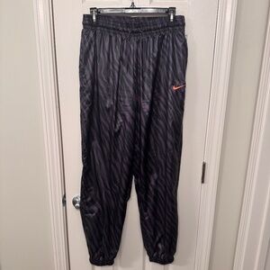 Women's Nike Purple and Black Zebra Print Icon Clash Cuffed Jogger, Size Small